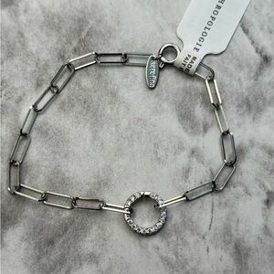 Silver Anthropologie chain bracelet with round diamond pendant